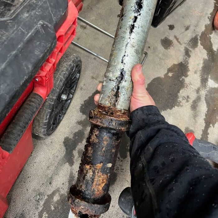 Corroded, leaking galvanized steel pipe removed from a Bakersfield home during a repiping project